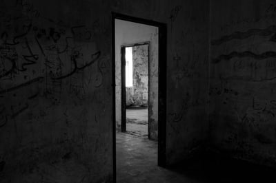 Abandoned rooms in a dark house