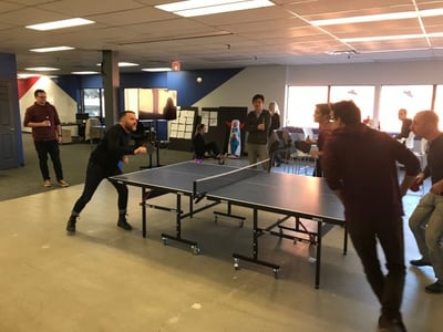 Yulio team playing ping pong